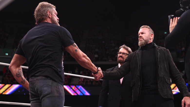 Adam Copeland y Christian Cage temblando las manos
