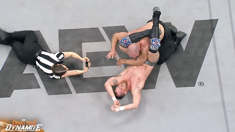 O'Reilly with a Triangle cinched in on Moxley