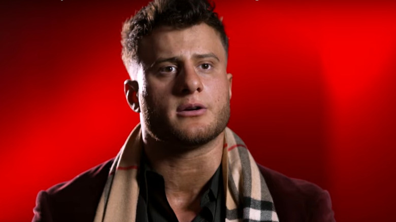 MJF wearing scarf