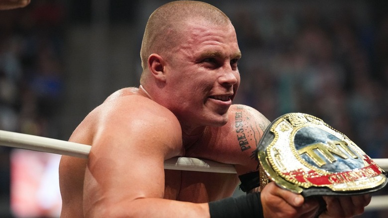 Kyle Fletcher holding the AEW TNT Championship