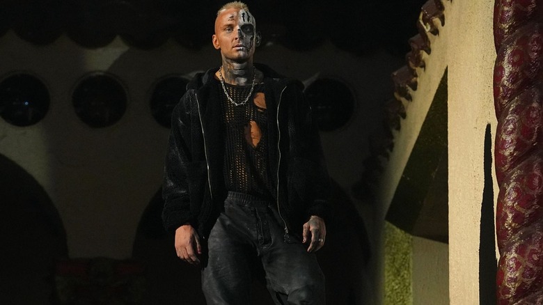 Darby Allin stands on the balcony of the Aragon Ballroom