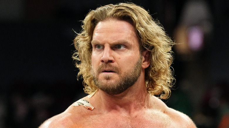 Hangman Adam Page with a crazed expression