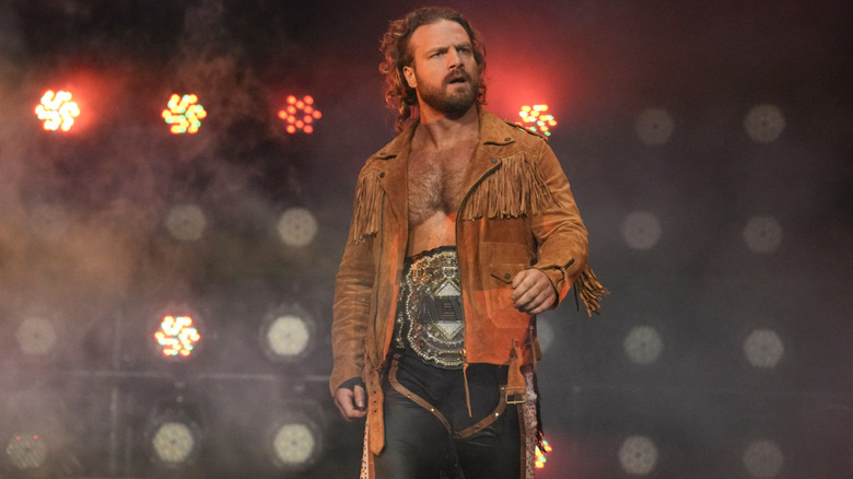 Page with his AEW World Championship belt on the entrance ramp