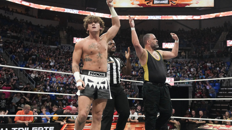 Kingston holding up HOOK's hand