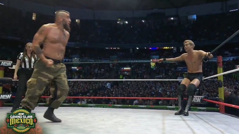 Briscoe and Okada in the ring
