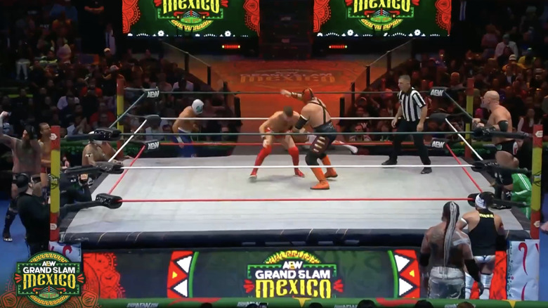 Several competitors at ringside