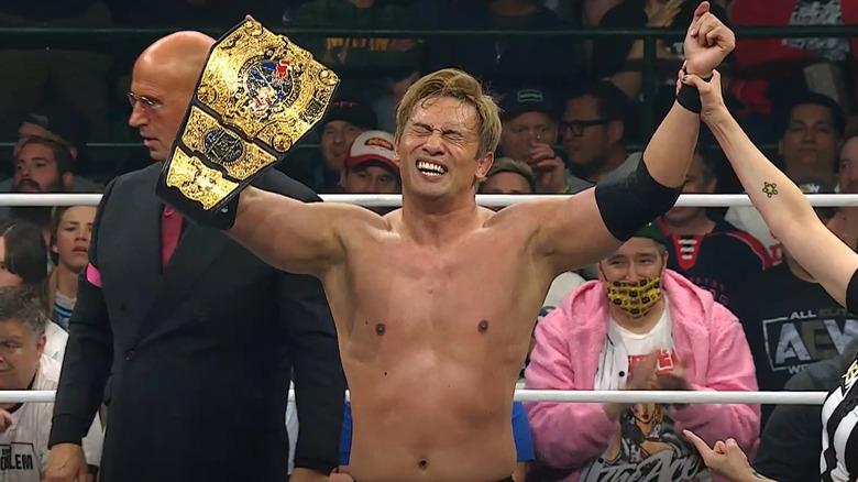 Kazuchika Okada celebrates with his International title