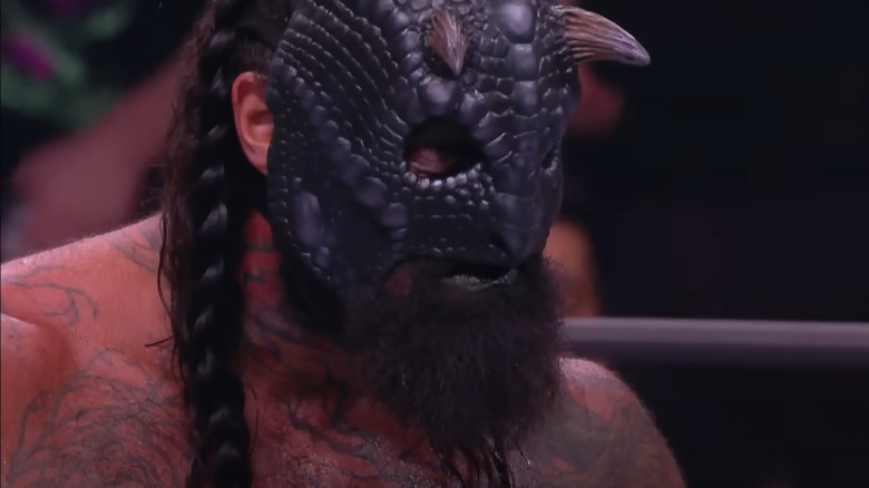 Luchasaurus wearing black variation of his mask