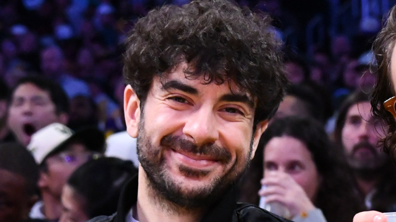 Tony Khan grinning at a Lakers game
