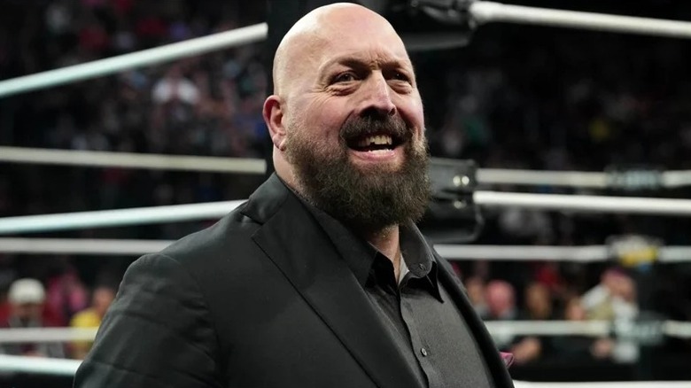 Paul Wight (former WWE star The Big Show) looks out toward the AEW crowd at ringside