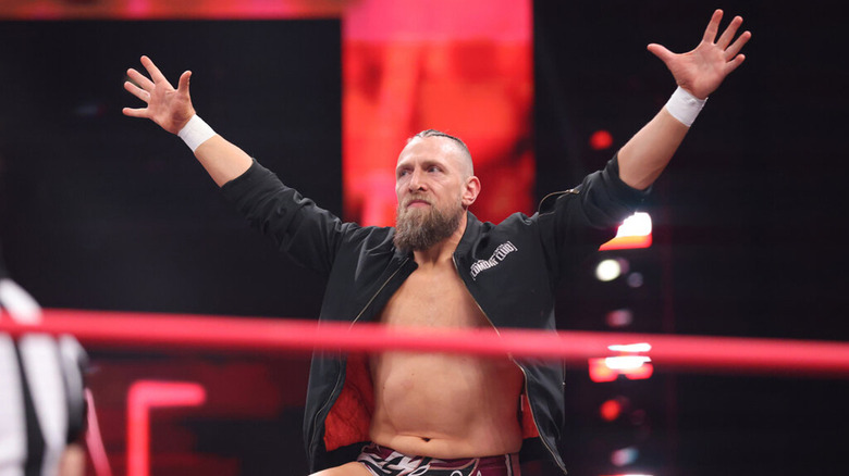 Bryan Danielson posing in the ring 