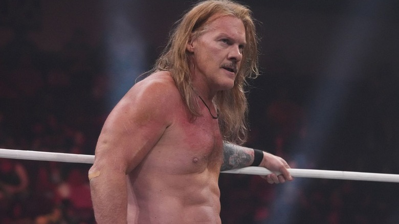 Chris Jericho holding the ring rope