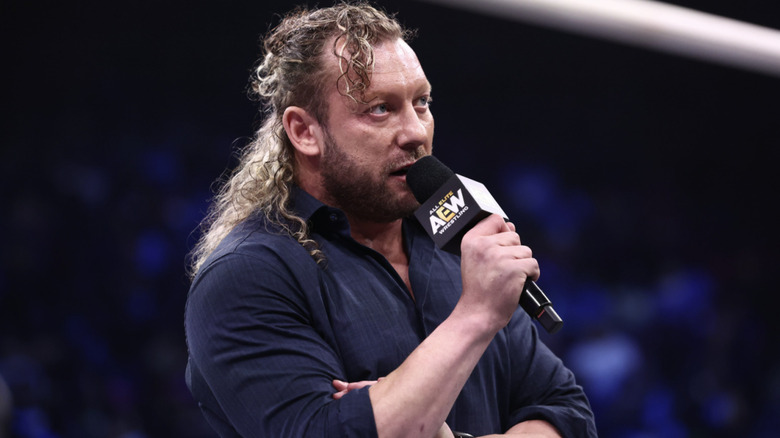 Omega talking inside the ring