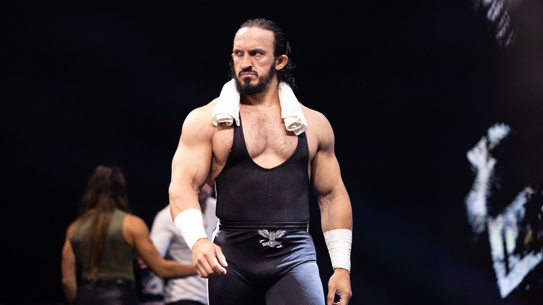 AEW star Pac makes his way down to the ring, towel around his shoulders, before a match on a June 2026 edition of 