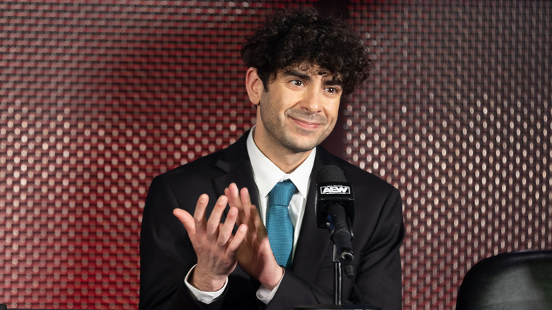 Tony Khan applauding