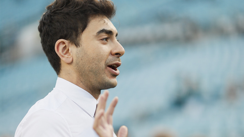 Tony Khan waving his hand