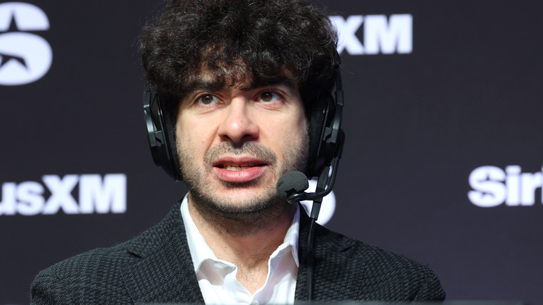 Tony Khan rocking a headset.