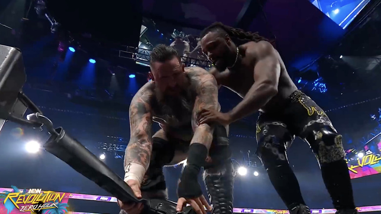 King and Strickland teetering on the ropes