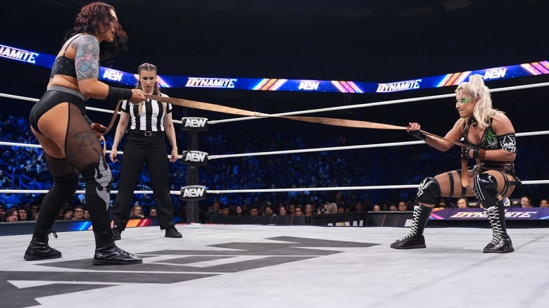 Kris Statlander and Thekla pull at opposite ends of a strap on "AEW Dynamite"