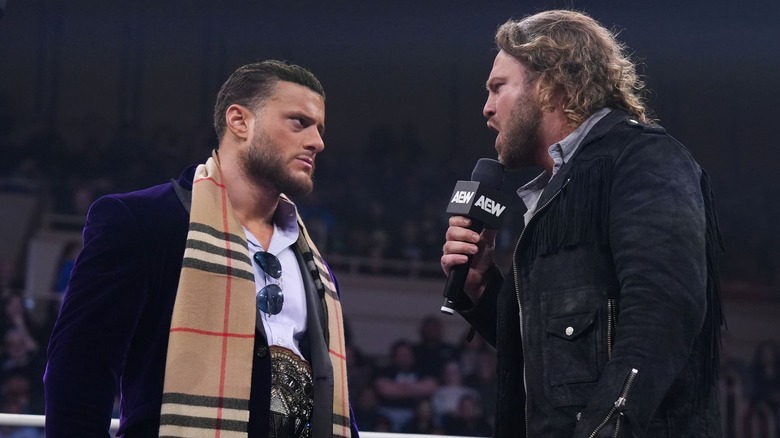 MJF and Adam Page staring off