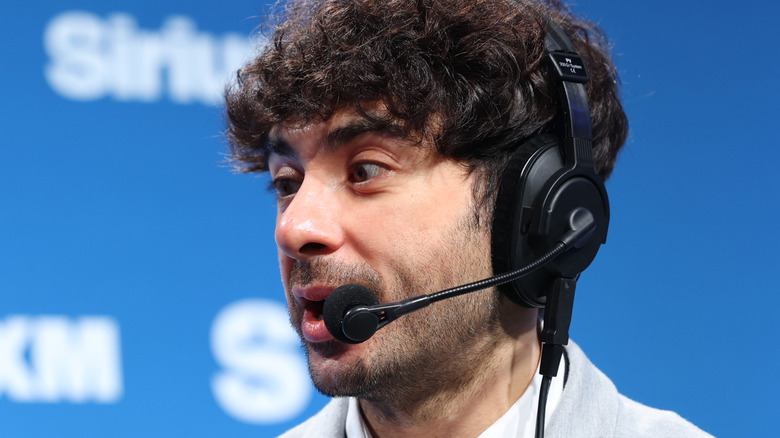 Close-up of Tony Khan at a SiriusXM event
