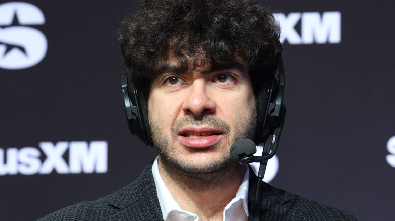 Tony Khan wearing a headset