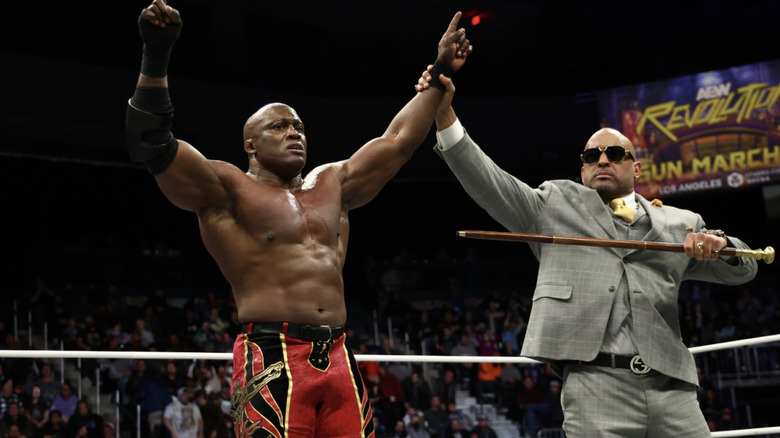 MVP holding up Lashley's hand