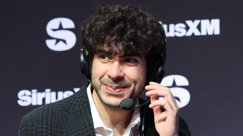 Tony Khan checking to see if his microphone is working