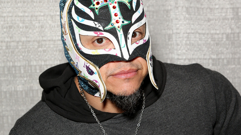 Rey Mysterio showcasing another of his masks