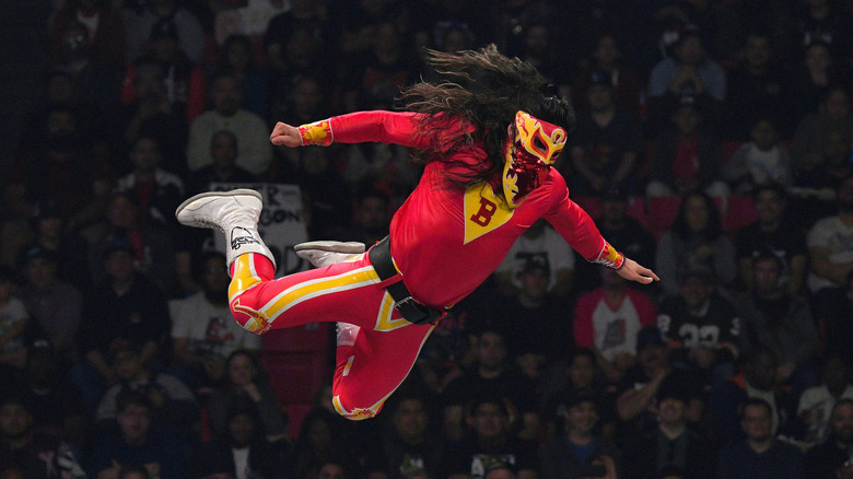 Bandido flying off the top rope