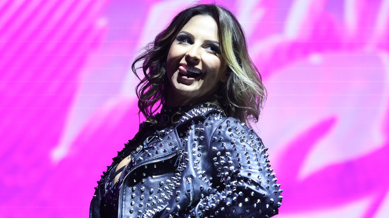 Harley Cameron in a spiky jacket smiling