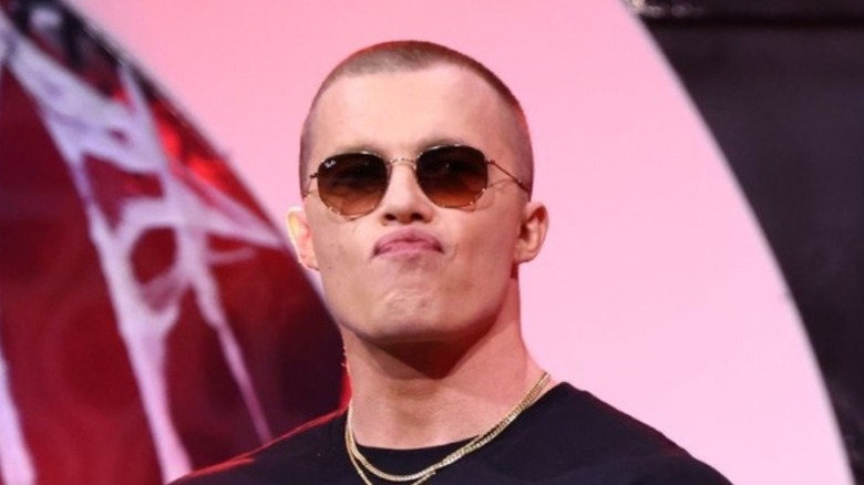Kyle Fletcher with shades and a duck face