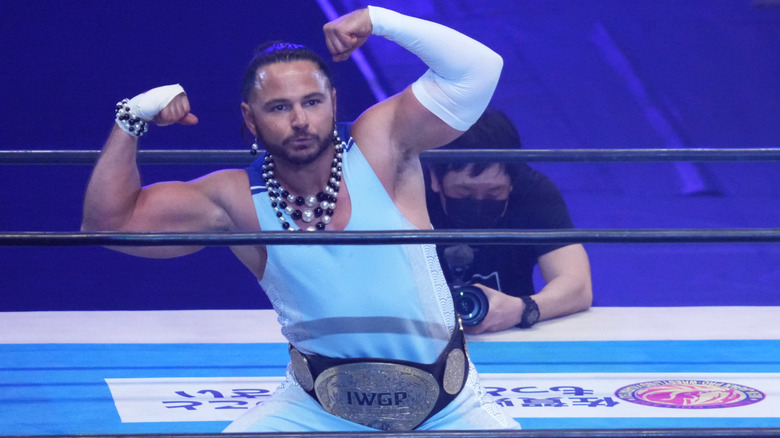 Matt Jackson poses with his IWGP Tag Team Championship before a title defense in NJPW