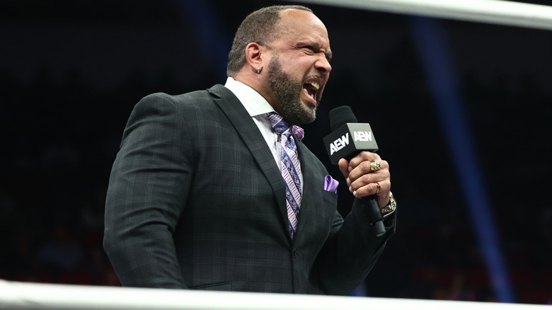 MVP yelling into an AEW mic