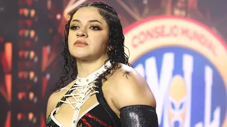 Persephone struts down towards the ring as part of AEW's Forbidden Door pay-per-view event