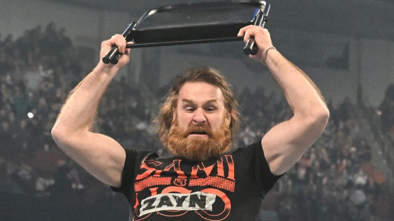 Sami Zayn wielding a steel chair