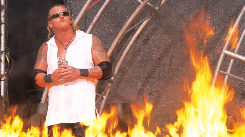 Gangrel takes in the heat with flames surrounding him before his match