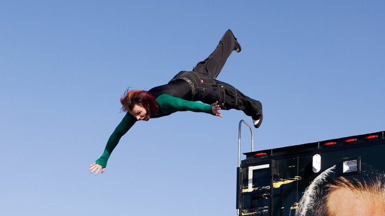 Jeff Hardy jumps off the top of a WWE production truck at One Night Stand 2008