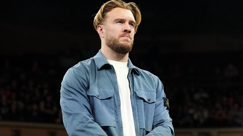 Will Ospreay wearing a blue shirt
