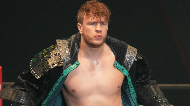 Will Ospreay wearing a black ring jacket