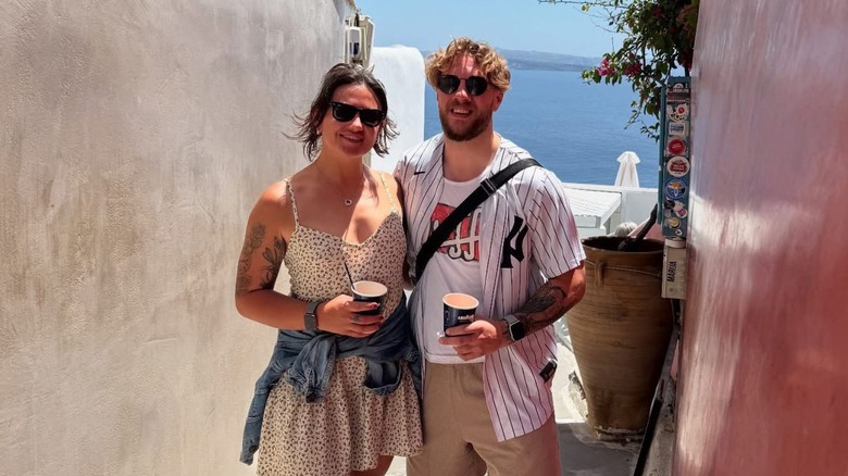 Will Ospreay and Alex Windsor pose together in a photo taken on a vacation to Greece.