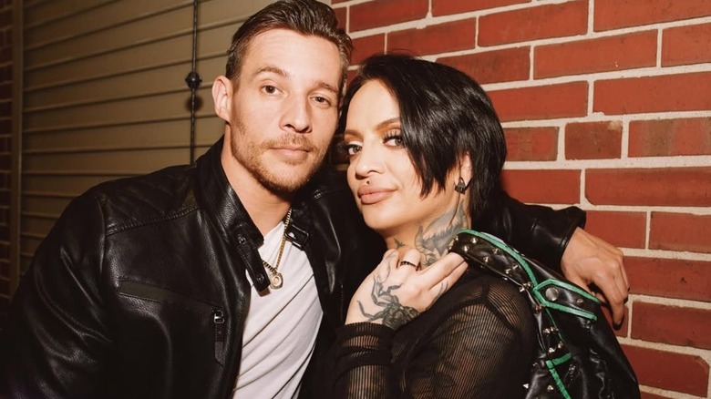Angelo Parker and Ruby Soho backstage in AEW posing for a picture together.