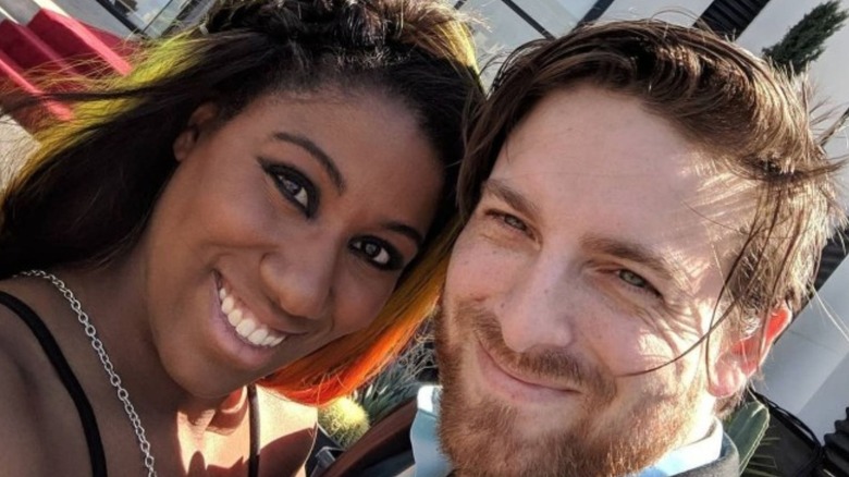 Athena poses for a smiling selfie alongside her husband, Matthew Palmer, in a photo posted to Instagram.