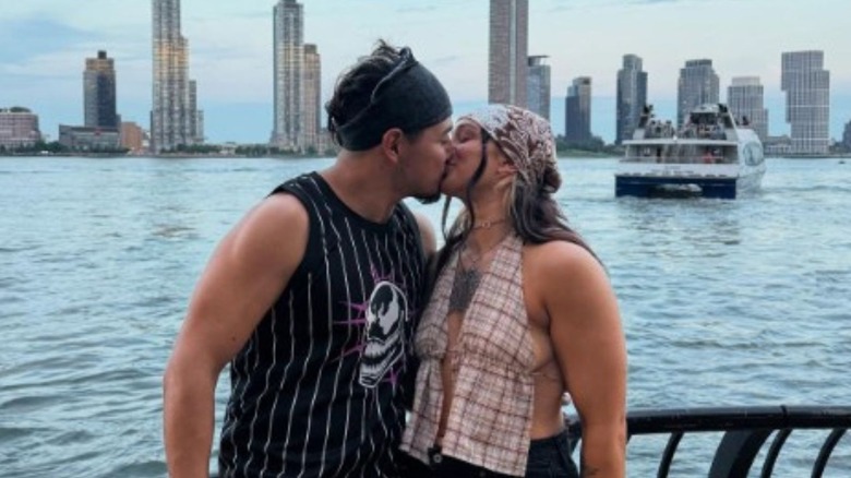 Kris Statlander plants a kiss on boyfriend Gino Medina in NYC in a photo posted to her Instagram.
