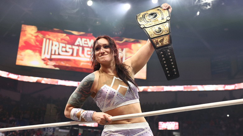 Kris Statlander raises the AEW Women's World Championship after a successful title defense against Toni Storm at WrestleDream.
