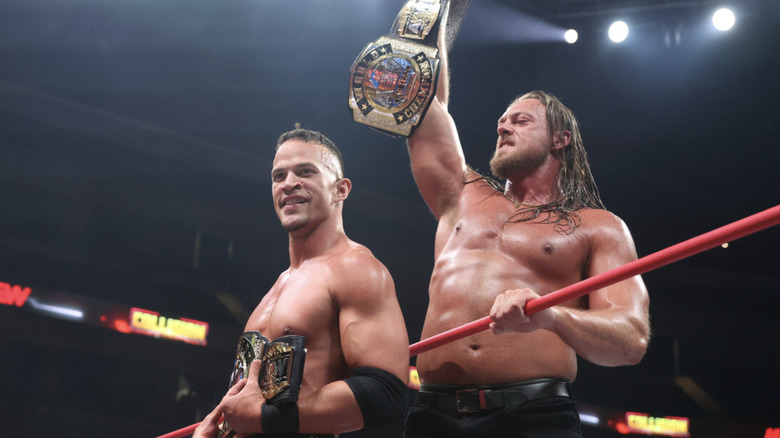 Ricky Starks and Big Bill holding their titles