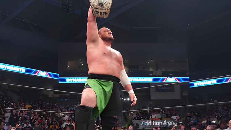 Samoa Joe raises AEW world title