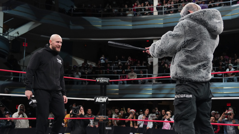 Darby Allin confronts Gabe Kidd with a bat in the middle of the ring during an episode of "AEW Collision."