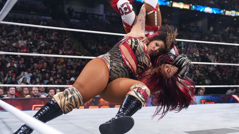 Willow Nightingale hits Mercedes Moné with a Death Valley Driver.