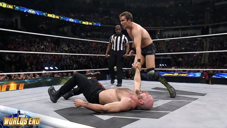 Moxley and Okada in the ring with one another